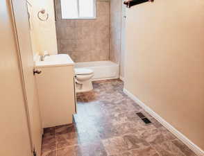 Full bath with vanity and shower / bath combination