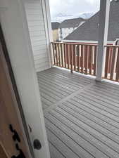 Wooden terrace featuring a mountain view