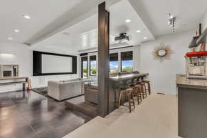 Home theater featuring recessed lighting and concrete floors