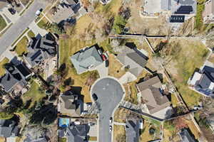 Aerial view of property's location featuring nearby suburban area