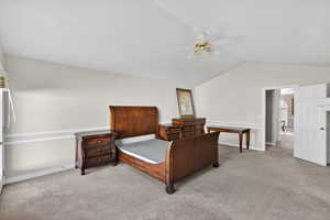 Master Bedroom with light carpet and ceiling fan