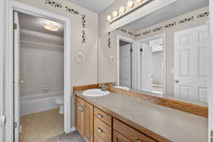 Full bathroom with vanity and shower / tub combination