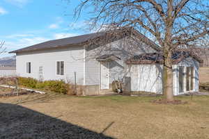 Large workshop/secondary garage with additional garden room attached