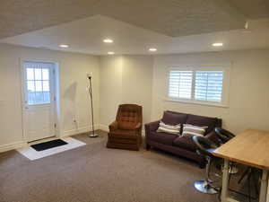 Living Area featuring Basement Entrance