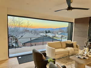 Interior space featuring ceiling fan, outdoor furniture, and a mountain view