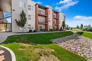 View of apartment building / complex featuring stairway