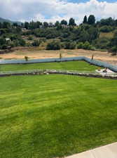 .62 Acre Fenced Backyard with firepit.