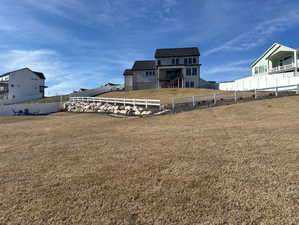 View of yard with a barn