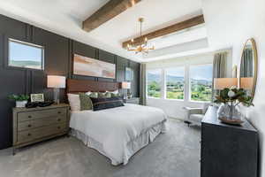 Owners bedroom featuring a mountain view, beamed ceiling.