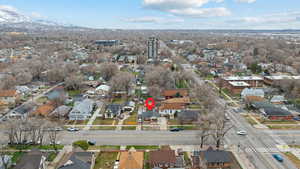 Aerial overview of property's location featuring nearby suburban area