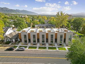 View of front of house featuring a mountain view and stucco siding