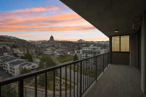 Balcony at dusk with a mountain view