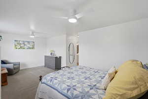 Primary Suite featuring carpet flooring and ceiling fan.