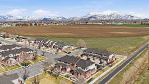 Aerial view of residential area featuring a mountain backdrop