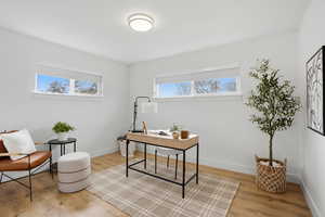 Upstairs Office area featuring light wood-type flooring and healthy amount of natural light