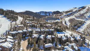 Snowy aerial view with a mountain view