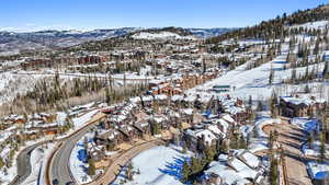 Snowy aerial view with a mountain view