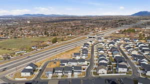 View of property location with nearby suburban area and mountains