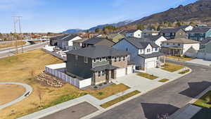 Aerial view of residential area featuring mountains