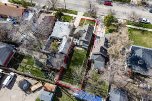 Aerial perspective of suburban area with property parcel outlined