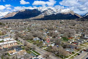 View of mountain backdrop with nearby suburban area
