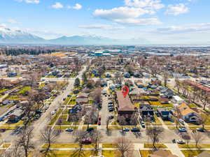 Aerial view of residential area featuring a mountain backdrop