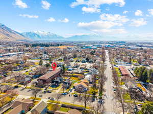 Aerial view of residential area with a mountain backdrop