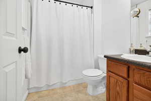 Bathroom featuring toilet and vanity