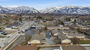 Aerial perspective of suburban area featuring a mountain backdrop