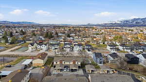 View of property location with a mountainous background and nearby suburban area