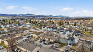 Aerial view of residential area featuring a mountain backdrop