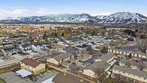 Aerial view of residential area with a mountainous background