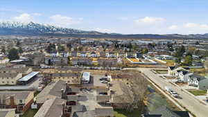 Aerial view of residential area with a mountainous background