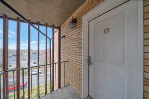 View of exterior entry with a residential view