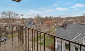 Balcony featuring a city view