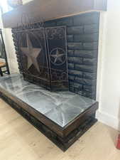 Brick and tile wood fireplace