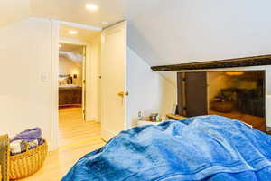 Bedroom featuring light wood-type flooring and recessed lighting