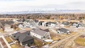 Aerial view of residential area with a mountainous background
