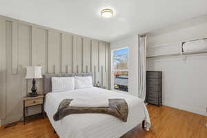 Bedroom featuring a closet and light wood-type flooring
