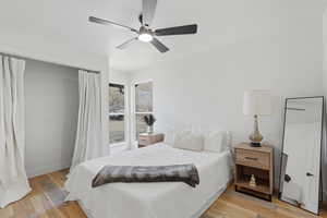 Bedroom featuring light wood finished floors and ceiling fan