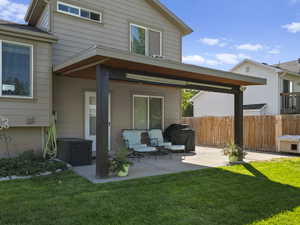 Back of house featuring a patio area Summer 2025