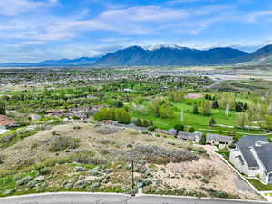 Mountain view with a local golf course and nearby suburban area