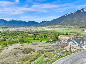 View of mountain backdrop featuring nearby suburban area and a golf club
