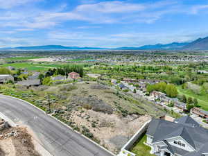 Aerial view of residential area with a mountain backdrop