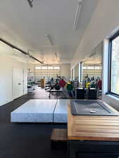 Garage featuring baseboards