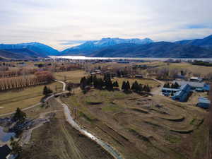 Aerial view of sparsely populated area with a mountain backdrop
