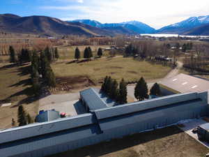 View of mountain background featuring rural landscape