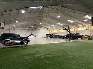 View of home's community with a high ceiling