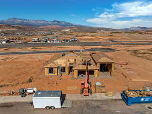 Aerial view of residential area with a mountain backdrop