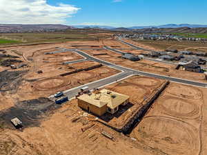 View of property location featuring a mountain backdrop and rural landscape